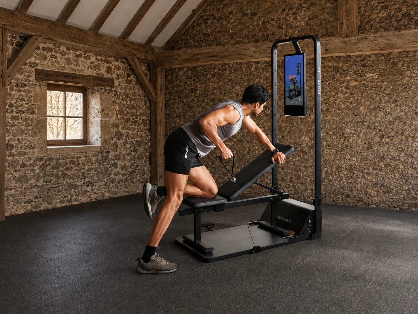 Cable-row training on the Speediance Gym Monster 2 in an edited barn setting, with Speediance branding visible