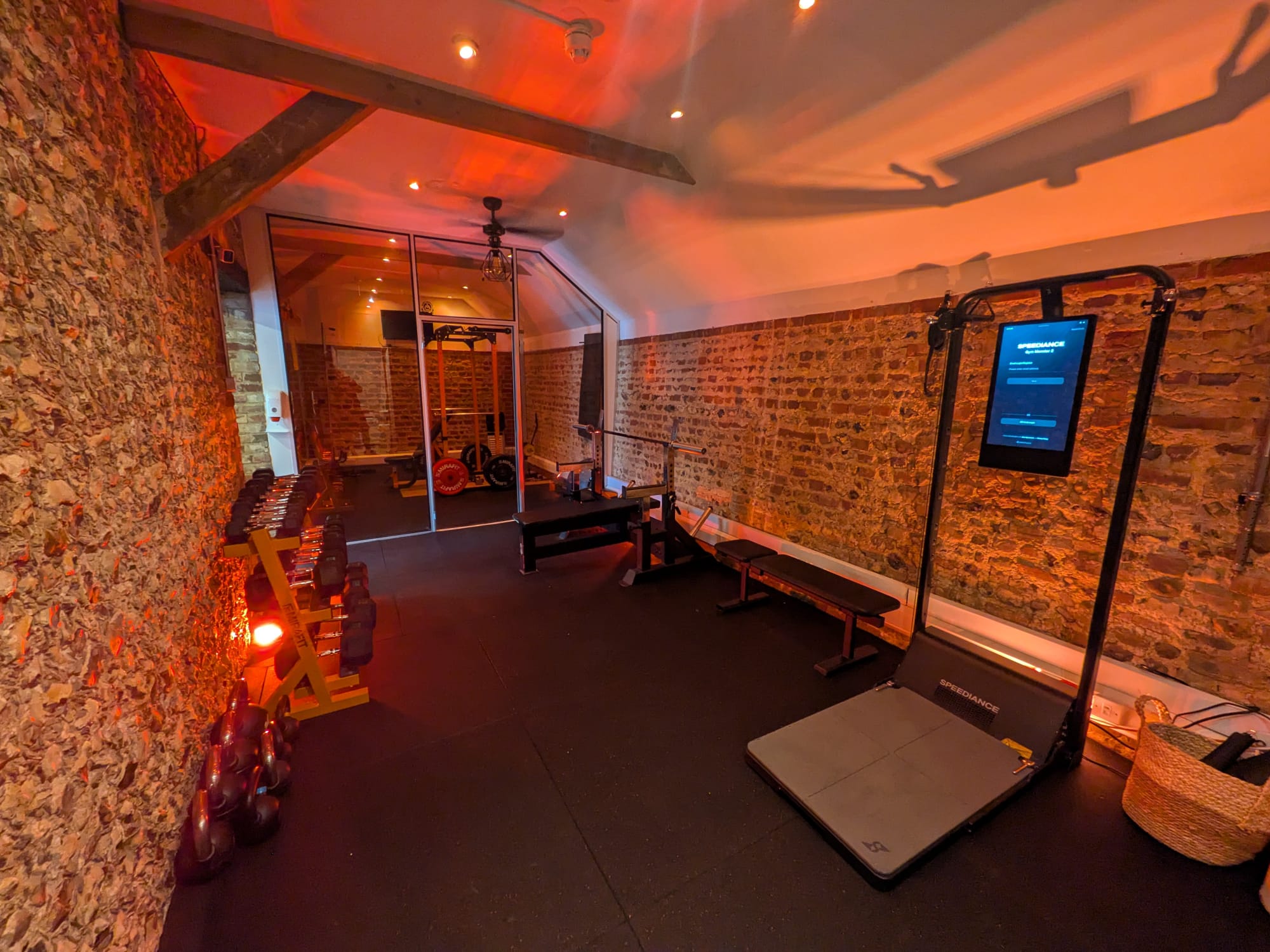 Members training with weights inside Astons Gym